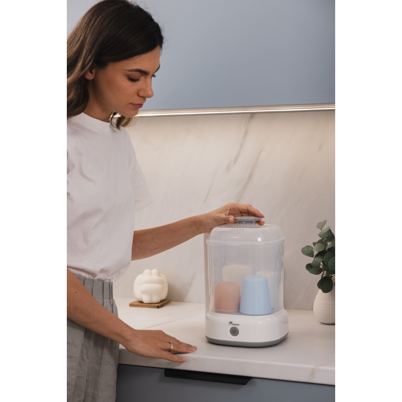 Kompakten beli sterilizator Momini QuickSteam